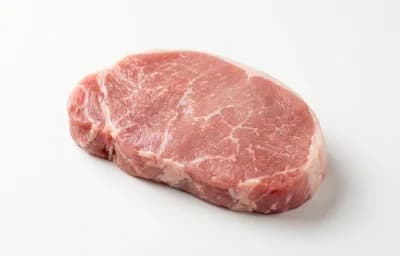 raw boneless pork leg cap steak