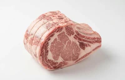 raw australian veal rib roast with fat