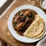 Chicken Chettinad, Malabar Parotta and Onion Raita