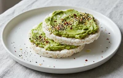 Rice Cakes with Avocado and Red Pepper Flakes
