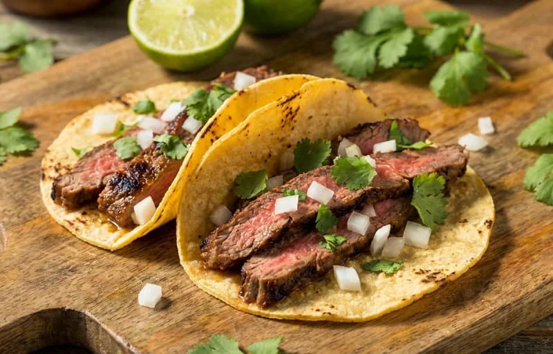 Steak Tacos, Grilled Onions, Pico de Gallo and Tex-Mex Refried Beans - Recipe 1