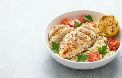 Grilled Chicken Bowl with Steamed White Rice Roasted Vegetables and Tahini Yogurt