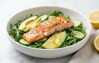 Salmon Arugula Salad with Avocado Olives and Lemon Dressing