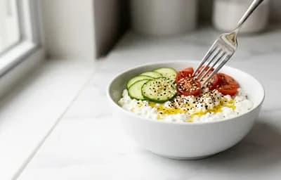 Savory Cottage Cheese Bowl with Mediterranean Chickpea Salad and Egg White Veggie Muffins